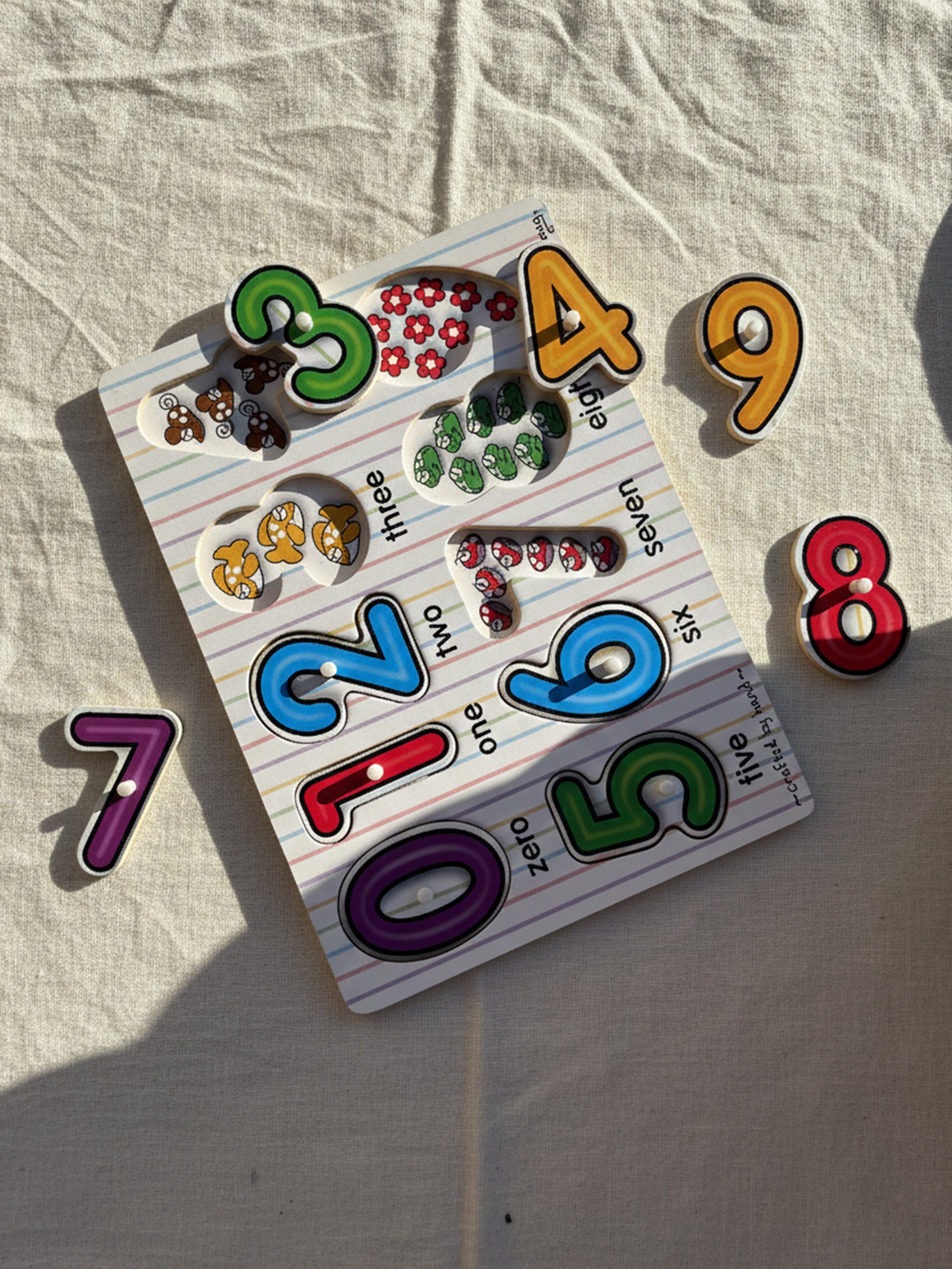 Pre-owned: See-Inside Numbers Peg Puzzle (10 Piece)